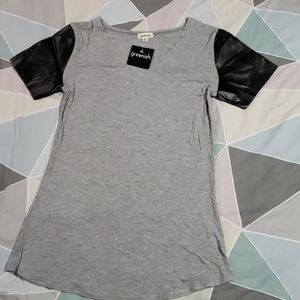 Gray v-neck tunic with vegan leather sleeves